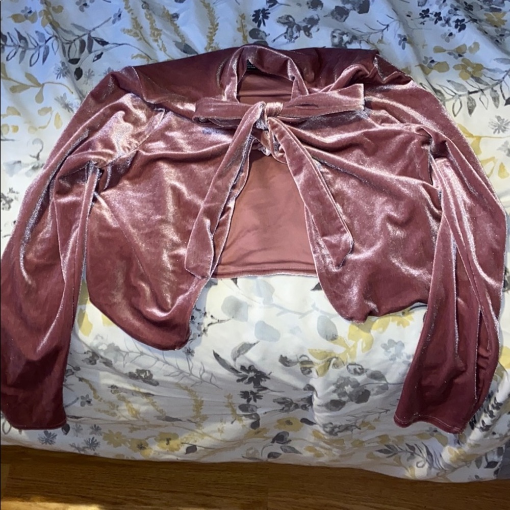 A long sleeve velvet jacket.